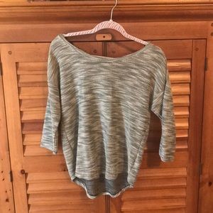 Cute black/white top. Pretty lace on back.